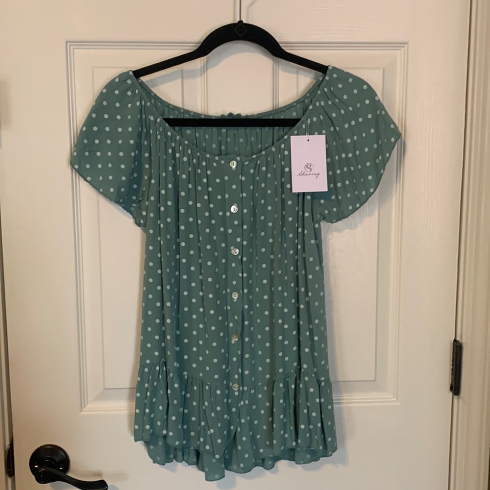 Short sleeve sage/green blouse.